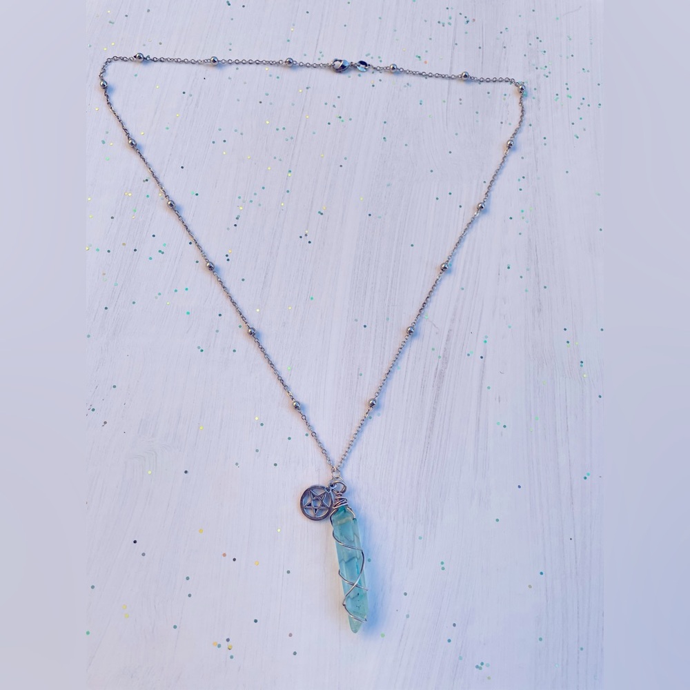 Pentacle quartz necklace in sterling silver .